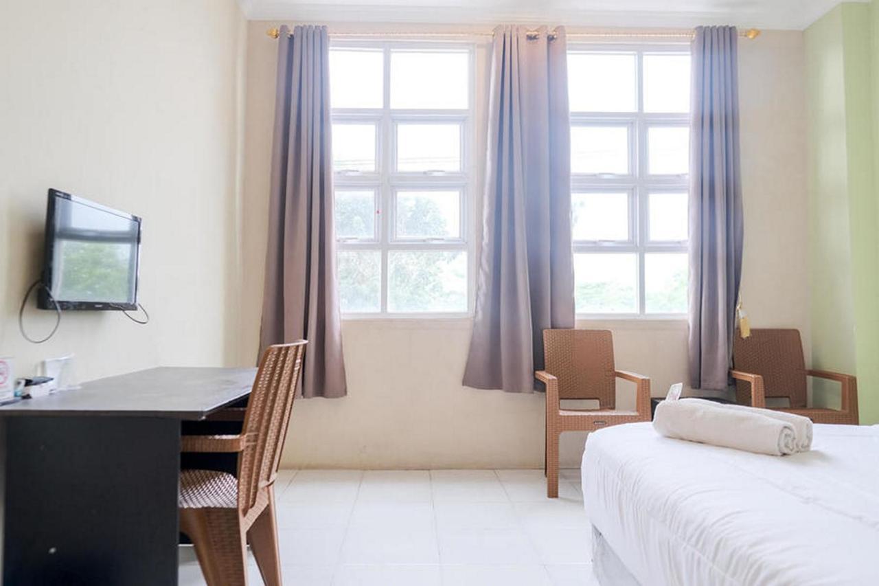 Urbanview Hotel Ta Ke Jelutung Puncak Jambi Exterior foto